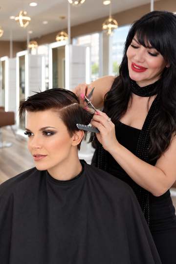 tylist shaping a short haircut for a client in Beverly Grove Los Angeles Salon