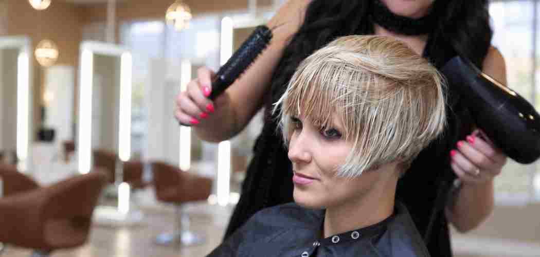 Woman with a finished short haircut at Gloss & Glam in Los Angeles