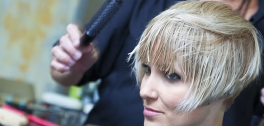 Stylist giving a pixie haircut at a Los Angeles hair salon
