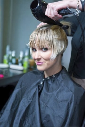 Long pixie haircut styled to the side in West Hollywood