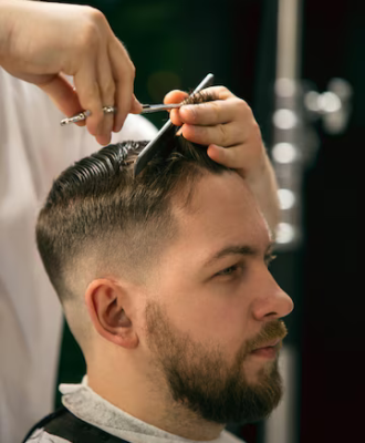 fresh-style-close-up-client-master-barber-stylist-getting-care-new-look-hairstyle-professional-occupation-male-beauty-self-care-concept-soft-colors-focus-vintage_155003-45364